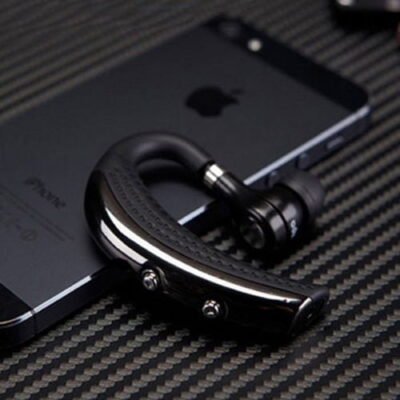 An iphone with a bluetooth wireless earpiece
